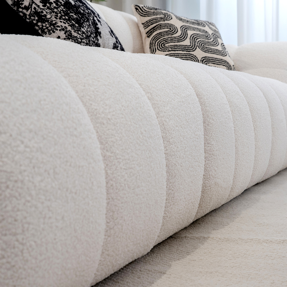 Kaareva k&auml;sinsohva